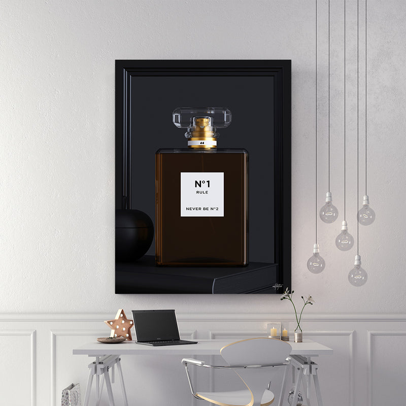 Coco Chanel perfume bottle wall decor in modern luxury office.
