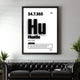 'Hustle' motivational wall art above a black leather couch.