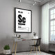 Motivational wall art using the word 'Success' in a modern home office