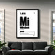 Motivational wall art of word 'Mindset' above a grey suede couch